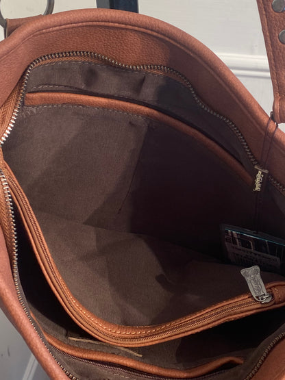 TRINITY RANCH HAIR ON COWHIDE CONCEALED CARRY TOTE